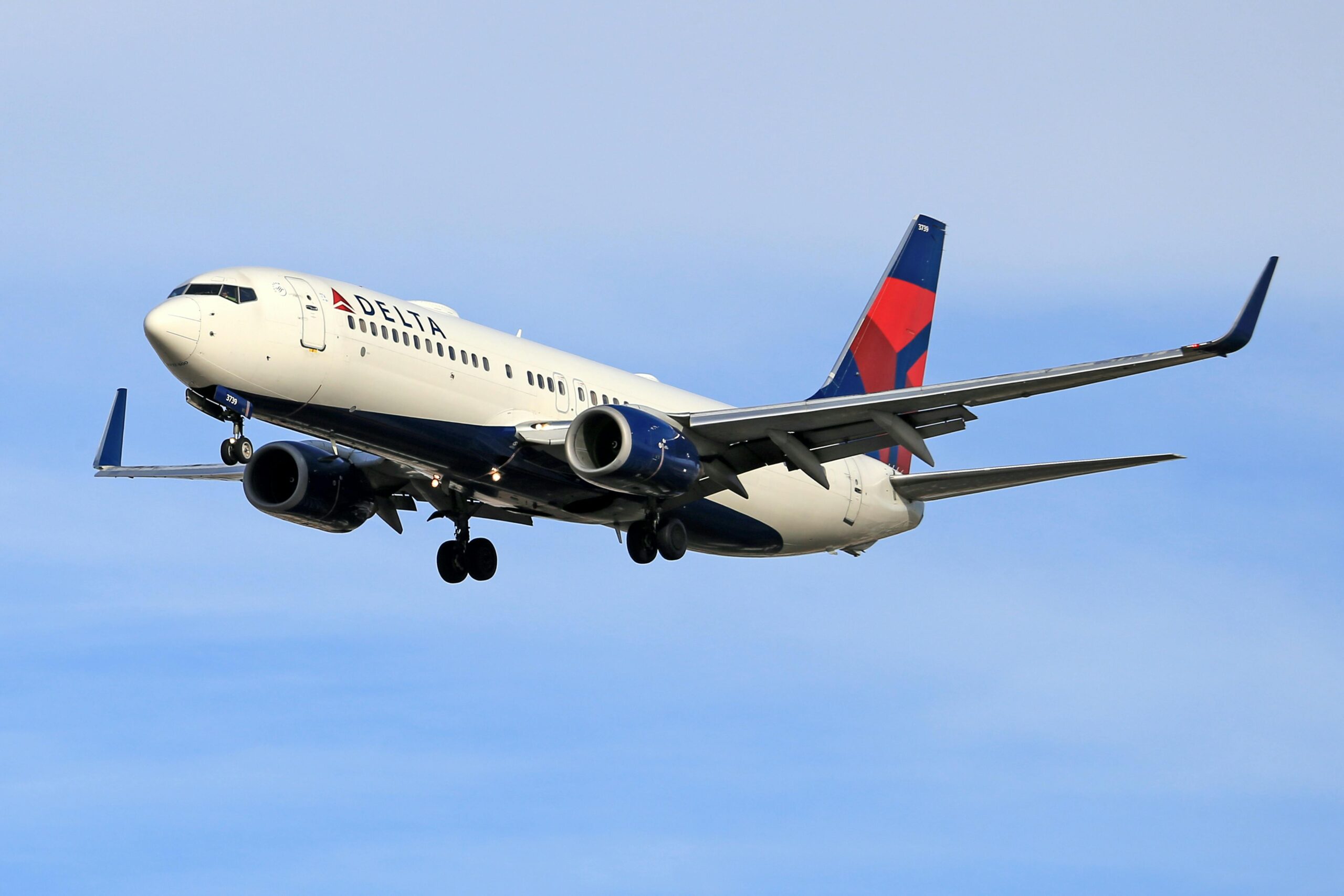 A Delta Airplane Flying in the Sky