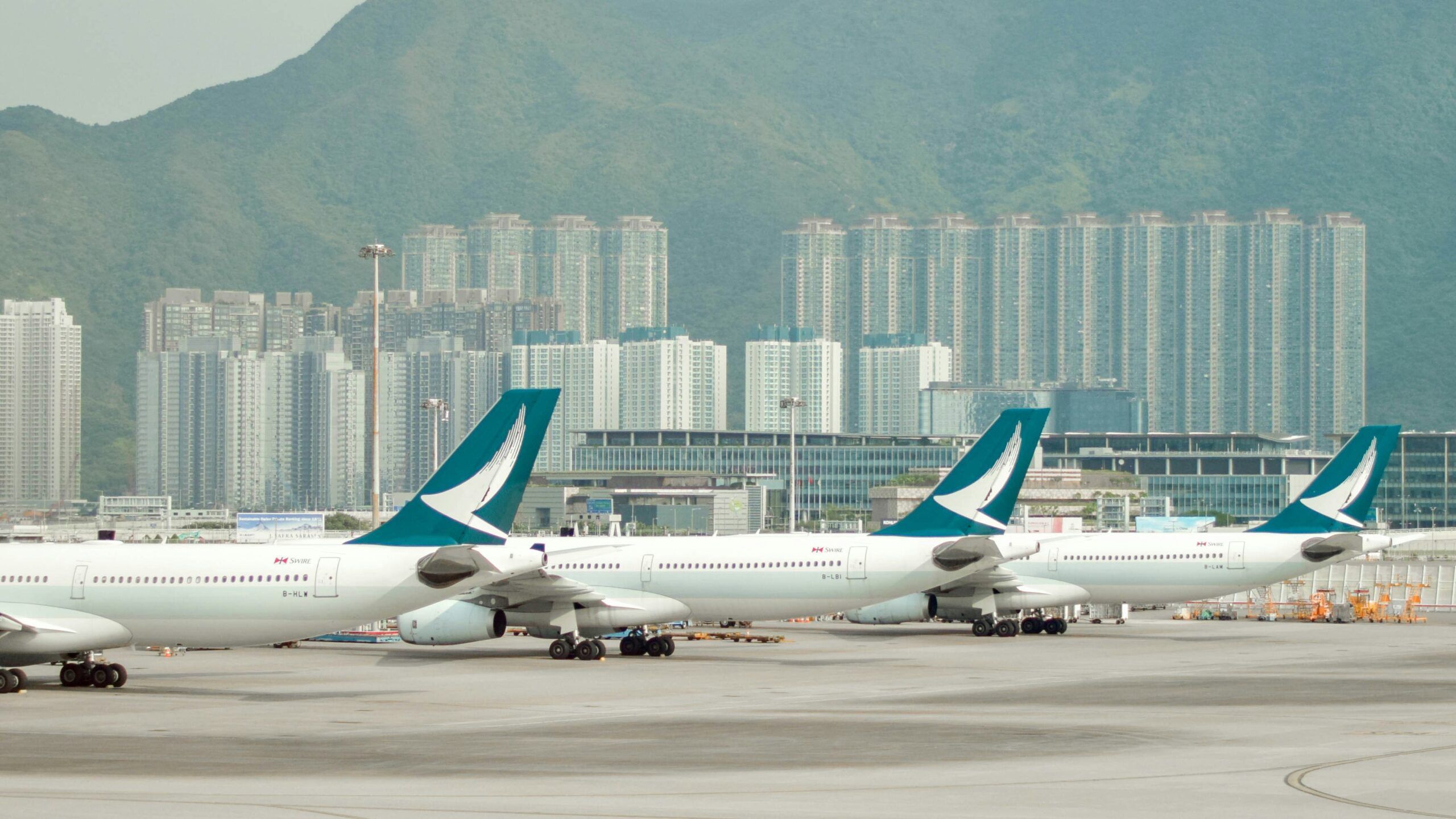 Cathay Pacific planes at airport.