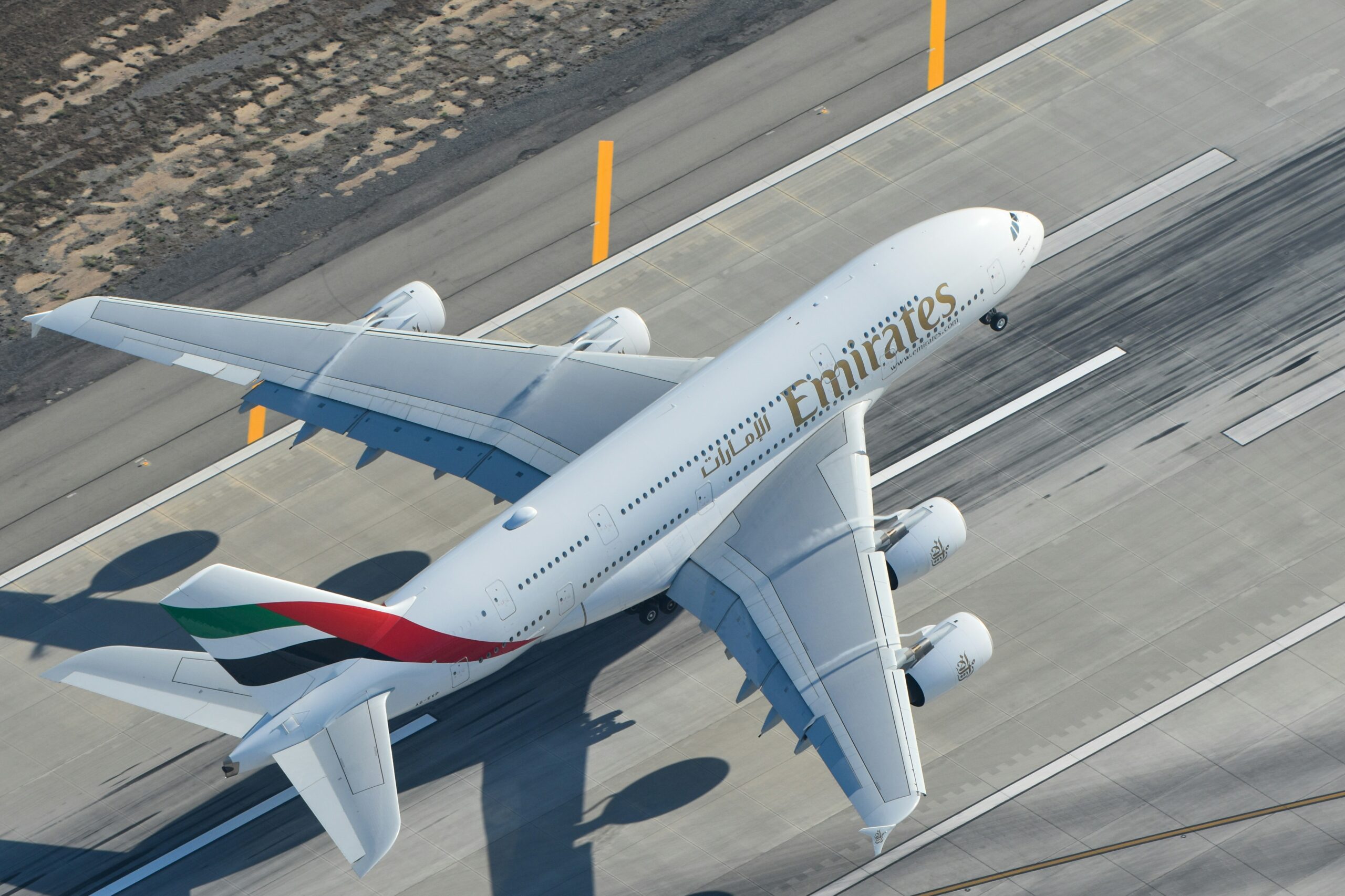 Emirates airplane on runway.