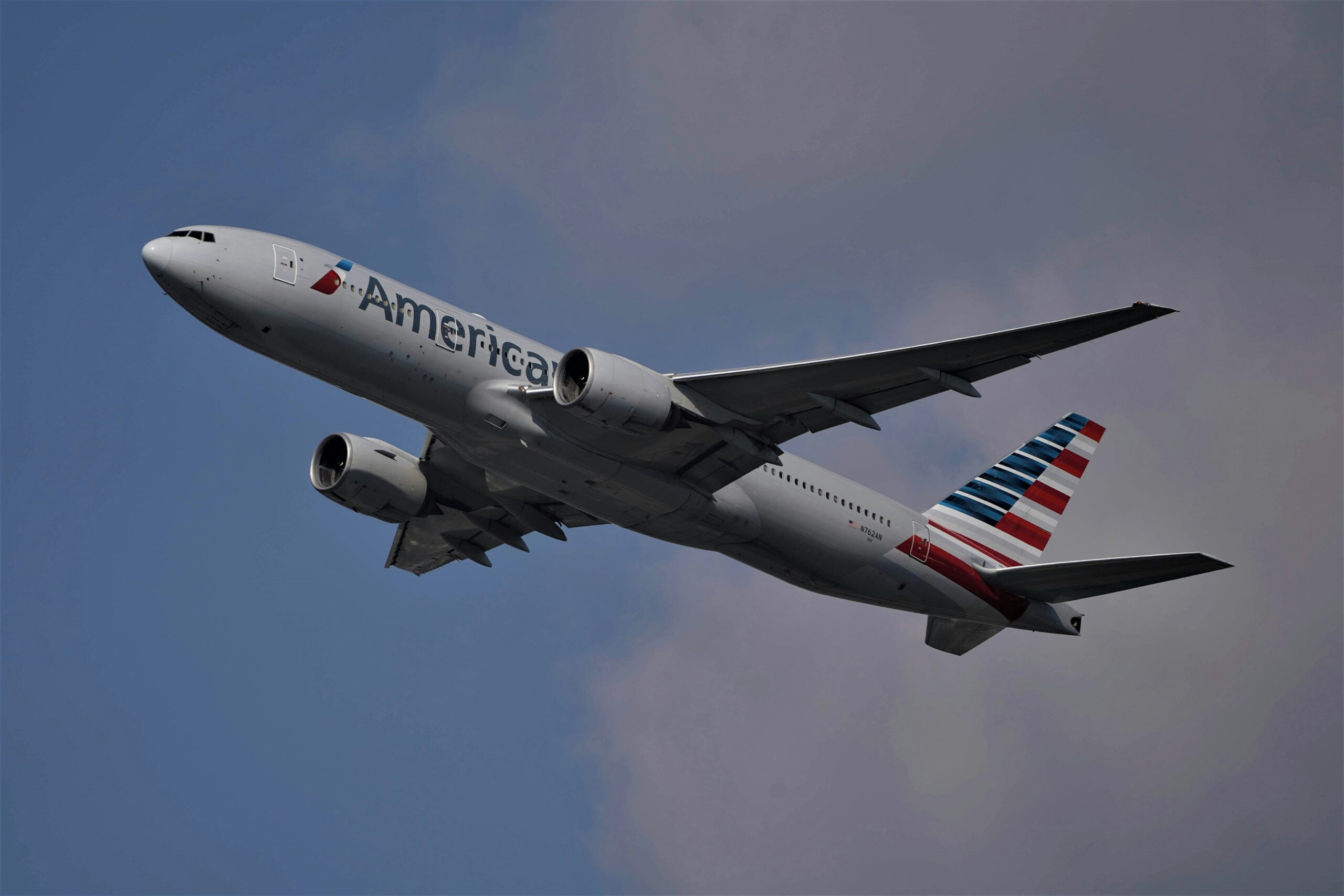 Passenger plane flying in the sky during daytime.