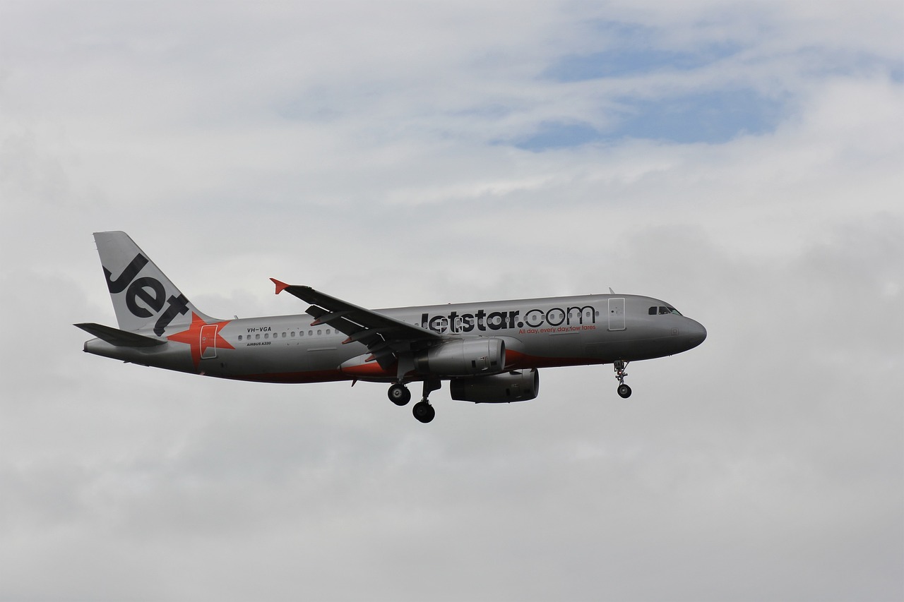 Jetstar plane in the sky.