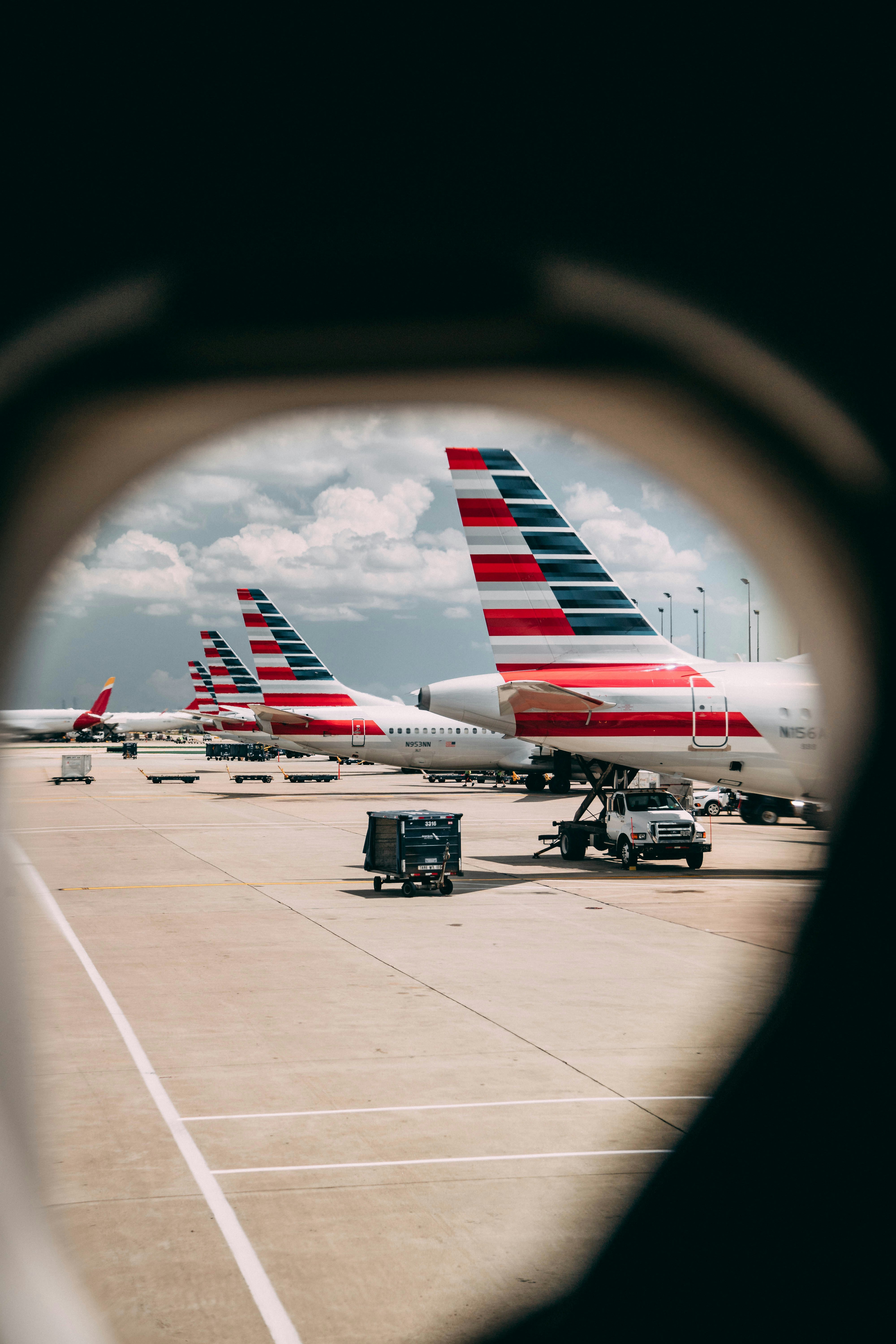 Vehicles near airplane.