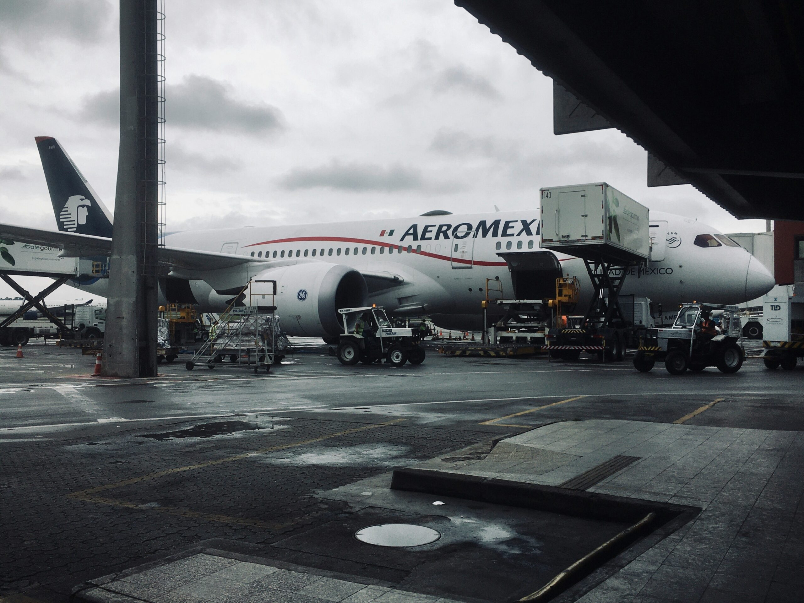 A large airplane is parked at an airport.