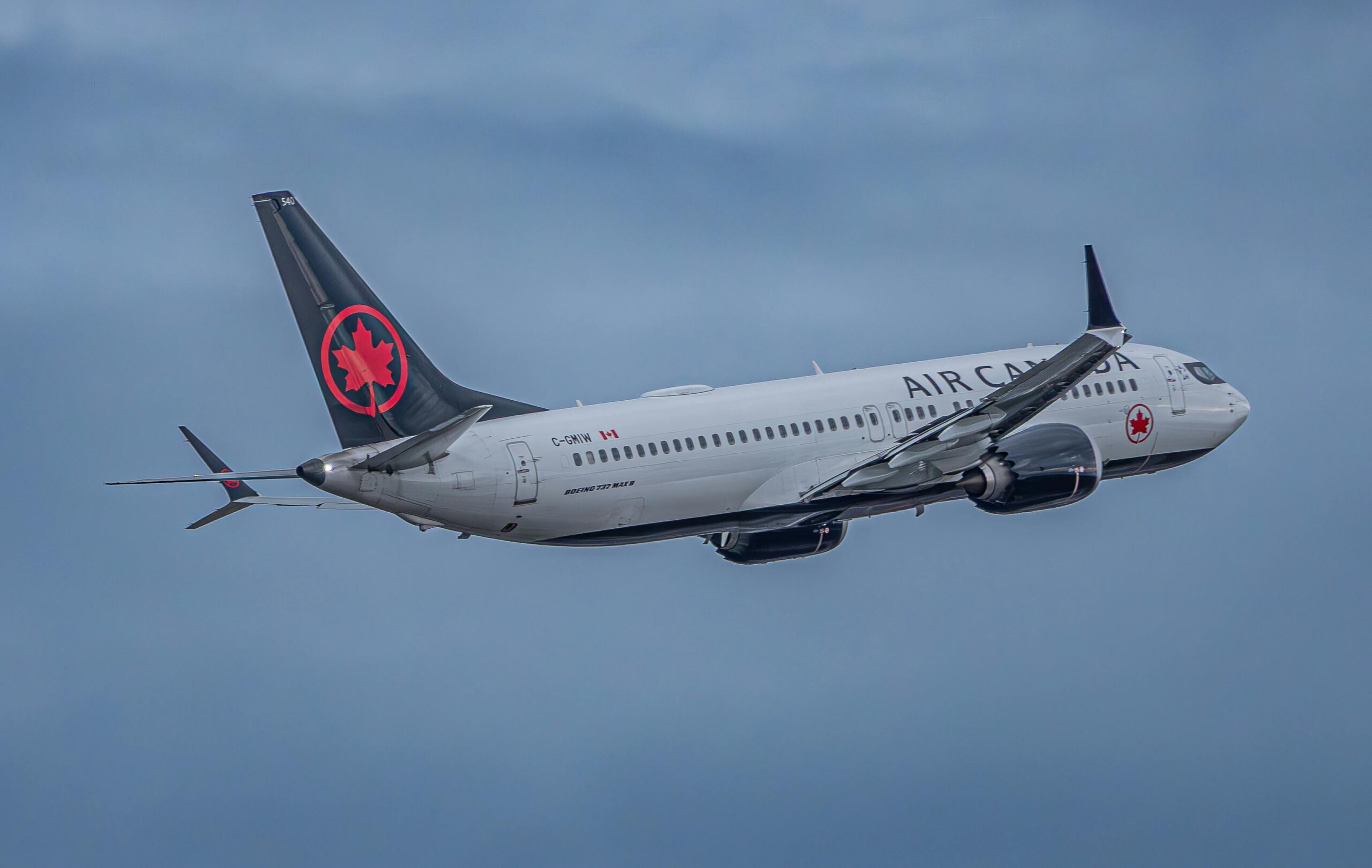 Air Canada plane in the sky.