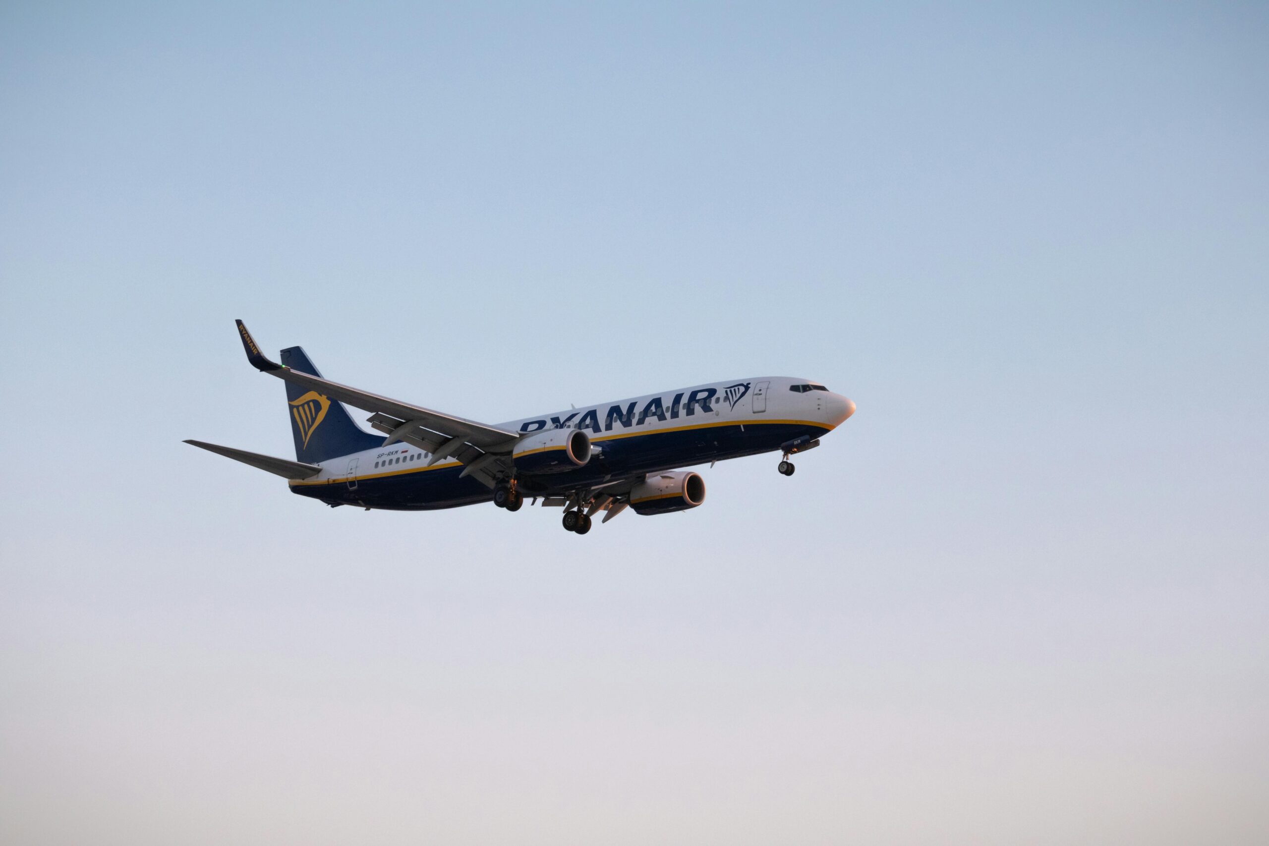 A large passenger jet flying through the sky.