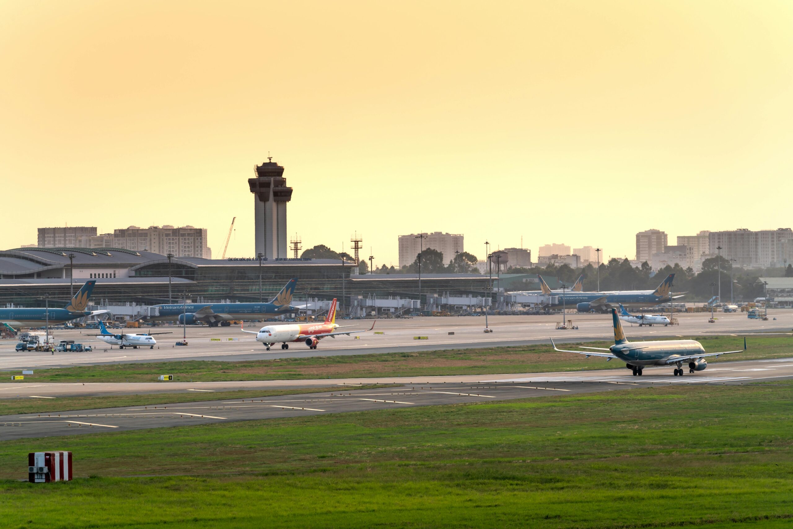 Airplanes in airport tarmac.