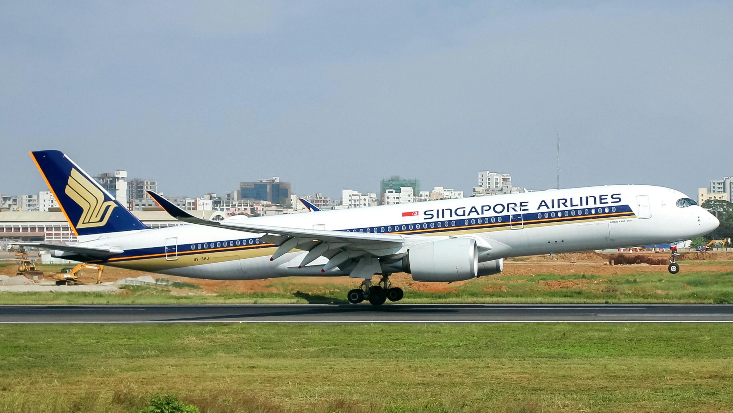 Singapore Airlines plane on the runway.