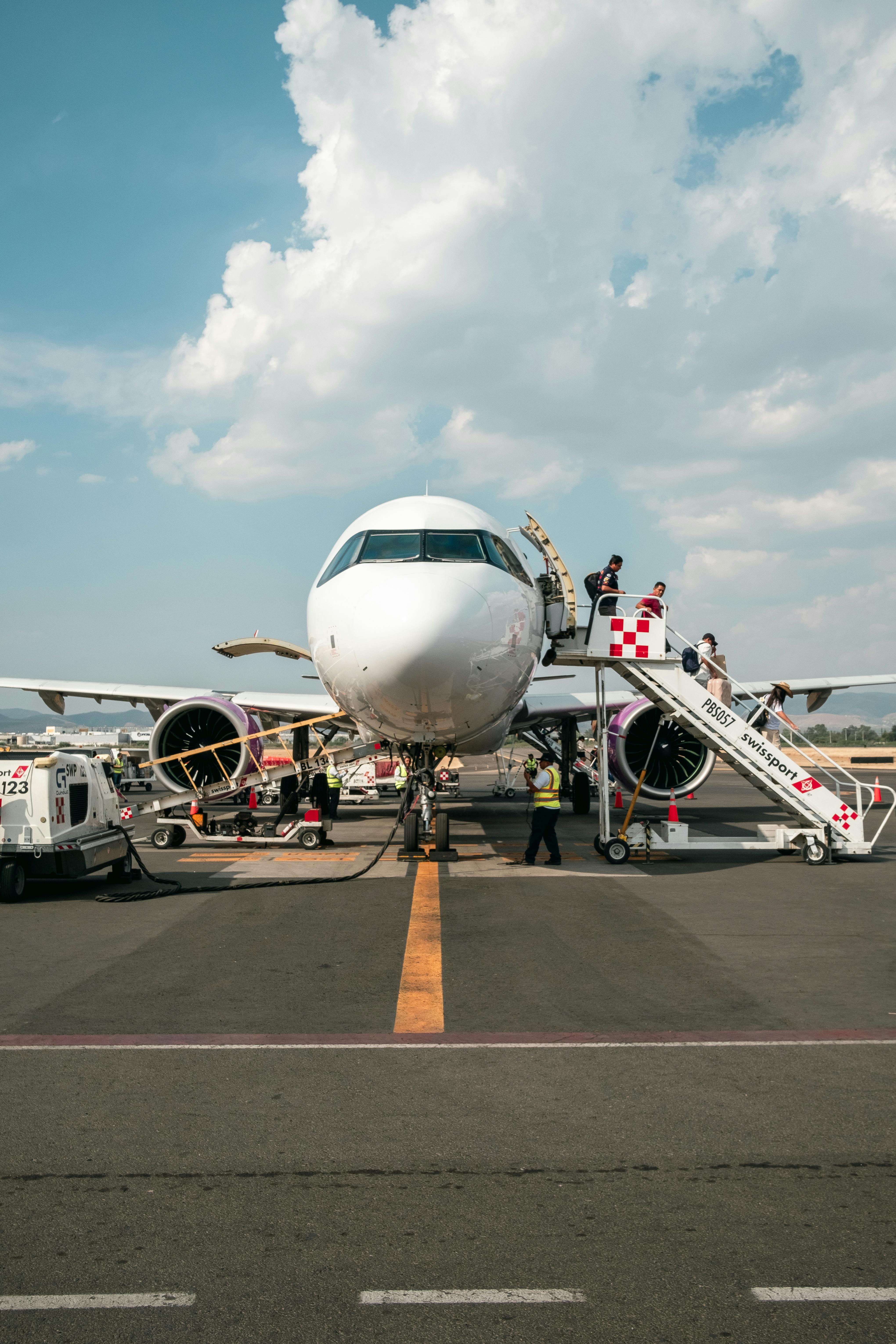 Passengers Walking Out of the Airplane.